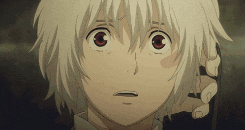 a close up of a person 's face with red eyes and white hair