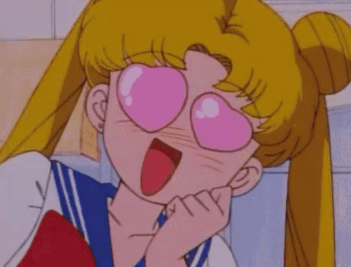 a cartoon girl wearing heart shaped glasses is smiling and making a face .