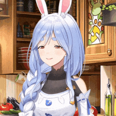 a girl with bunny ears is smiling in front of a shelf that says pekora usada