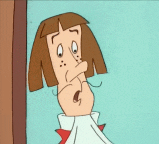 a cartoon character with brown hair and a mustache is making a funny face