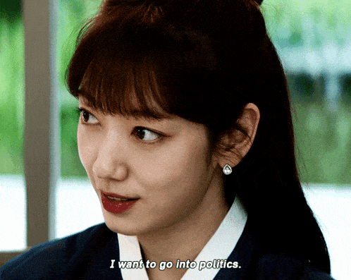 a woman says " i want to go into politics " in front of her face