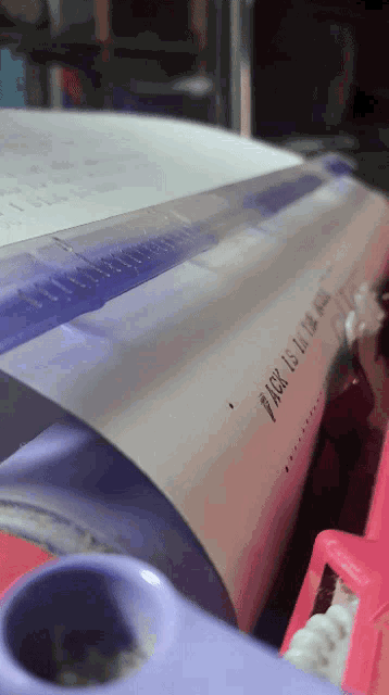 a piece of paper that says " ask is the answer " is laying on a table