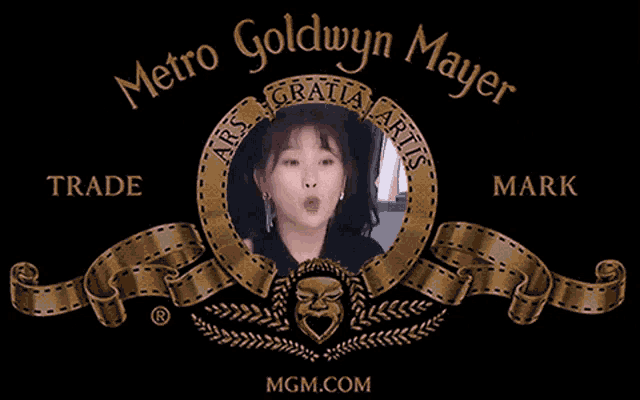 a metro goldwyn mayer logo with a picture of a woman in it
