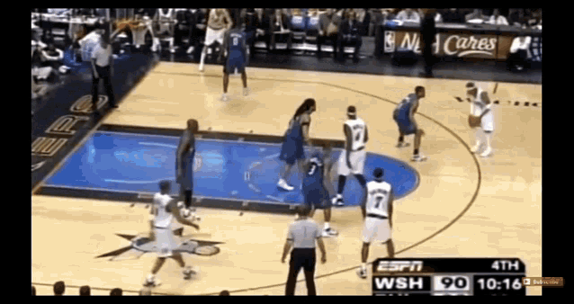 a basketball game is being played on espn and the score is 90 to 20