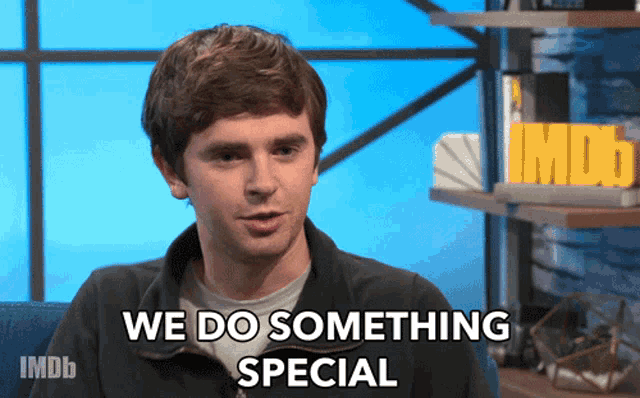 a man says we do something special in front of a imdb sign