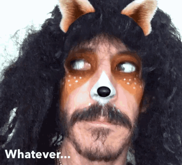 a man with a dog face painted on his face and the word whatever on the bottom