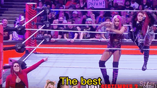a woman in a wrestling ring with the words " the best live " on the bottom