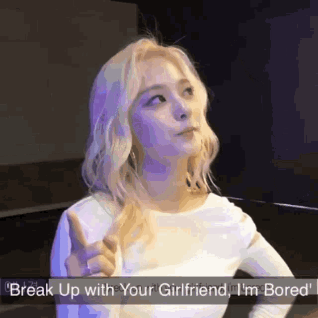 a picture of a woman with the words break up with your girlfriend i 'm bored on the bottom