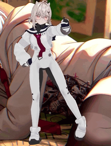 a girl in a white suit is standing in front of a pile of blankets