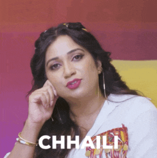 a woman wearing a white shirt has the word chhaili on her shirt