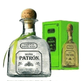 a bottle of patron silver tequila is next to a green box