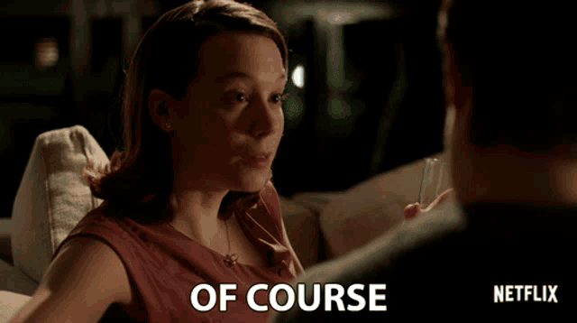 a netflix ad shows a woman sitting on a couch with a glass in her hand
