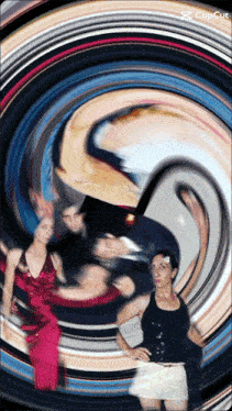 a woman in a black tank top stands in front of a colorful swirl that says copcut on it