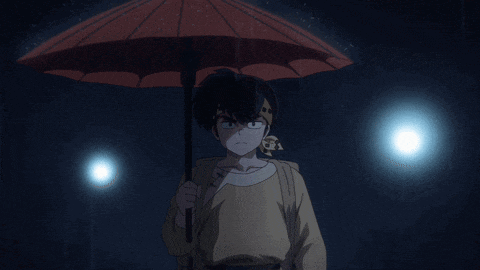 a man holding an umbrella in the rain