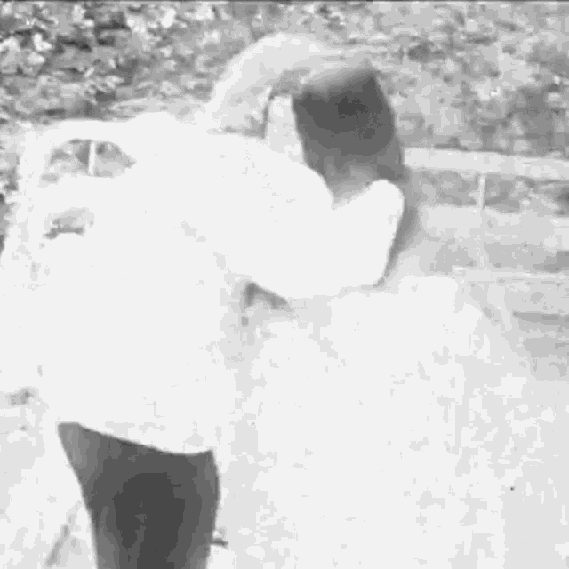 Hugging Yoko Ono GIF - Hugging Yoko Ono John Lennon GIFs