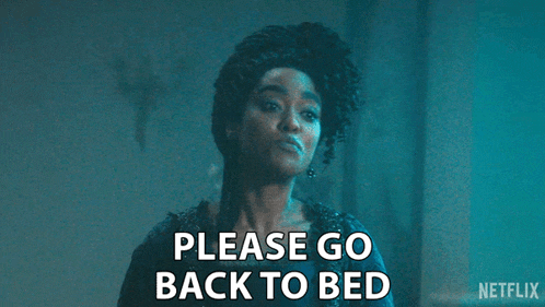 a woman is saying please go back to bed in a dark room
