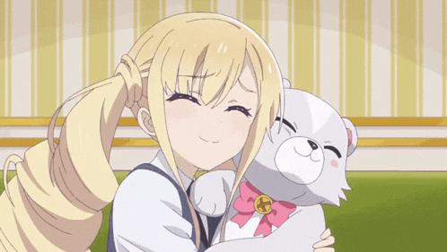 a blonde girl is hugging a white teddy bear with a pink bow