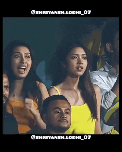 a group of people sitting in a stadium with a caption that says shriyansh lodhi 07