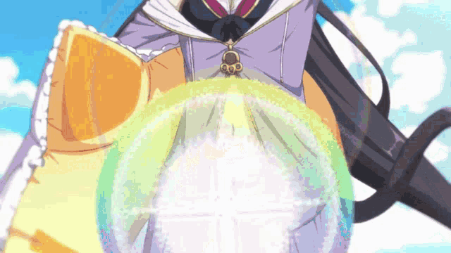 a girl in a purple dress is holding a rainbow colored ball