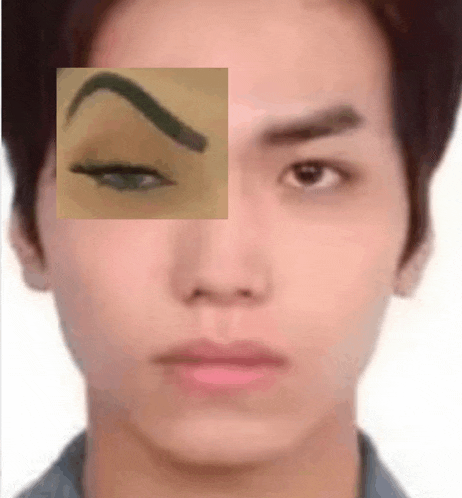 a close up of a man 's face with a drawing of a woman 's eyebrow .