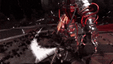 a video game character with a red cape is being attacked by a giant robot .