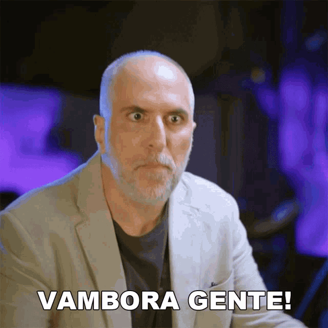 a bald man with a beard and the words vanbora gente