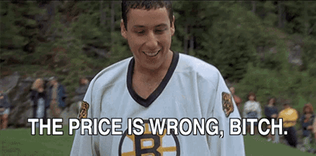 a man wearing a jersey with the letter b on it