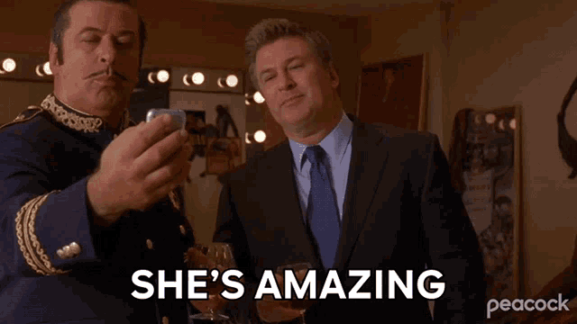 a man in a suit says she 's amazing