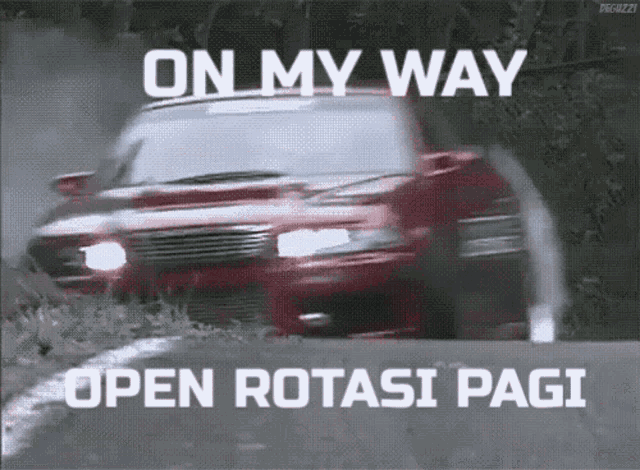a red car is driving down a road with the words " on my way open rotasi pagi " above it
