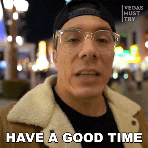 a man with glasses says have a good time