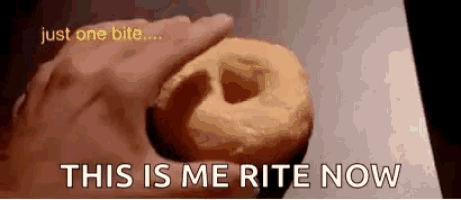 a person is holding a donut in their hand with the words `` this is me rite now '' written above it .