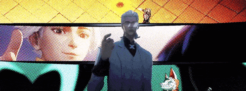 a man in a suit is standing in front of a screen with a woman behind him .