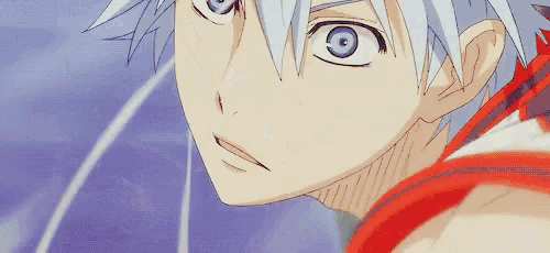 a close up of a person 's face with blue eyes and white hair