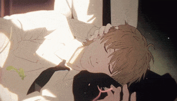 a man in a tie is laying on a bed with his head on a pillow