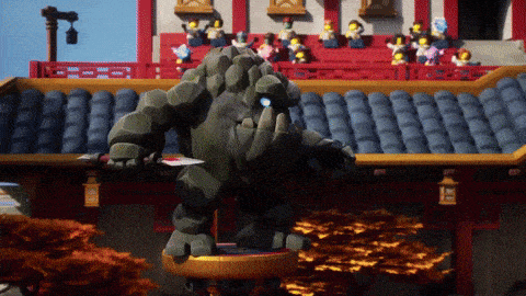 a statue of a monster with a knife in his hand