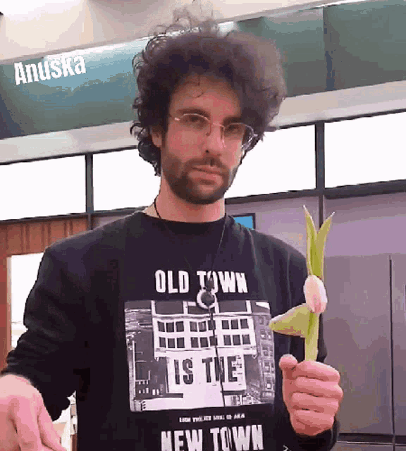 a man wearing an old town is the new town t-shirt