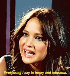 a woman says " everything i say is funny and adorable " in yellow letters