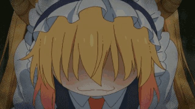a maid with horns covering her face with her hand
