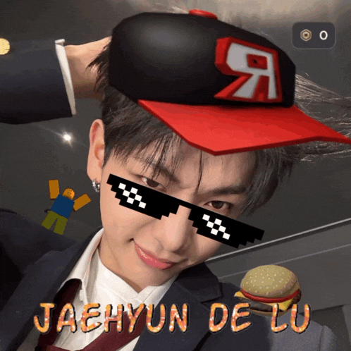 a man wearing a hat and sunglasses with the name jaehyun de lu on the bottom