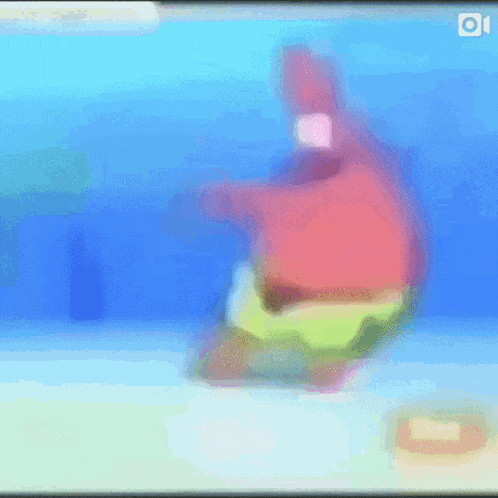 patrick star from spongebob squarepants is floating in the water .