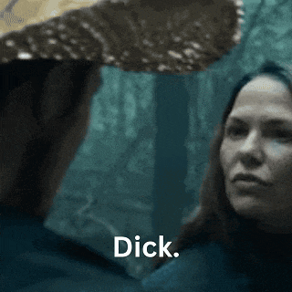 a man and a woman are looking at each other and the woman says dick