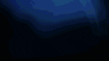 a blurry picture of a person 's feet in the dark