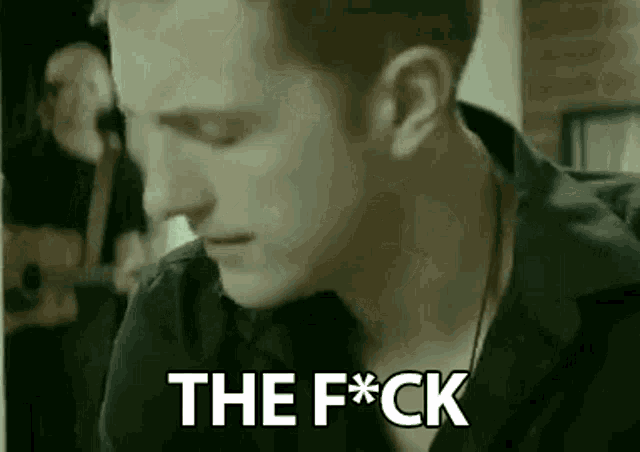a close up of a man 's face with the words the f * ck on it .