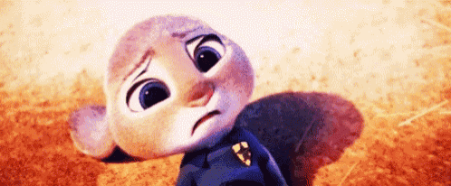 a close up of a cartoon rabbit with a sad look on its face .