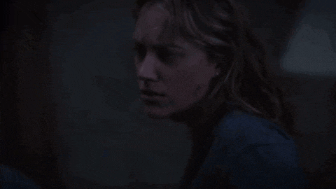 a woman is asking who was that in a dark room .