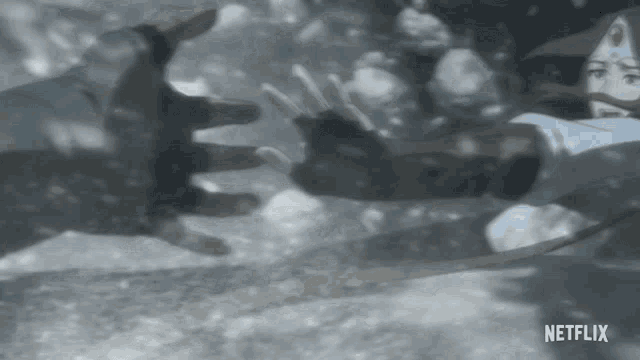 a close up of a person 's hands with a netflix logo in the bottom right corner
