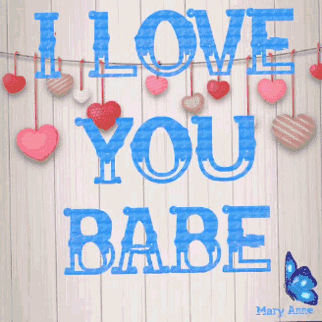 a poster that says i love you babe with hearts hanging from a string