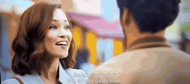 a woman talking to a man with the words another cousin no smold girlfriend