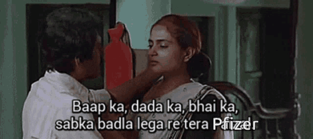a man is touching a woman 's face in a room with a caption that says pfizer