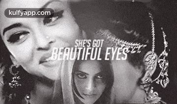 it is a black and white photo of a woman with beautiful eyes .